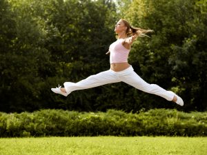 woman leaping in air